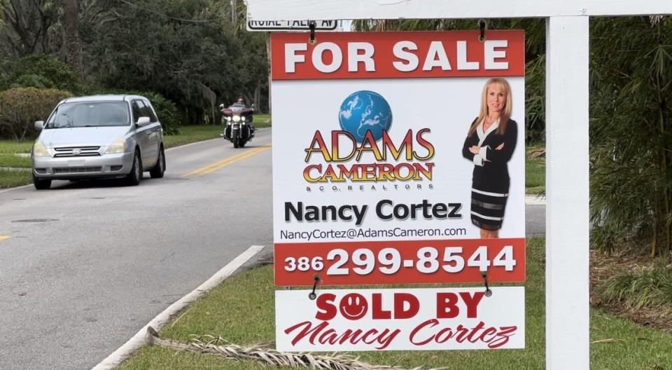A sold sign can be seen along John Anderson Drive in Ormond Beach on Tuesday, Nov. 21, 2023. It was in front of a 7-bedroom, 8-bath, 8,274-square-foot mansion at 211 John Anderson Drive that sold on Nov. 10, 2023 for $2.7 million. Its sale comes on the heels of the Florida Realtors' home sales report for October which showed two dozen luxury homes selling for more than $1 million in Volusia County.