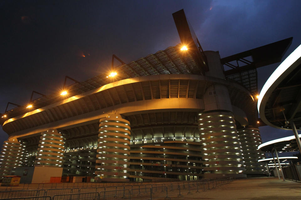 The Stadium's distinctive towers lit up at night