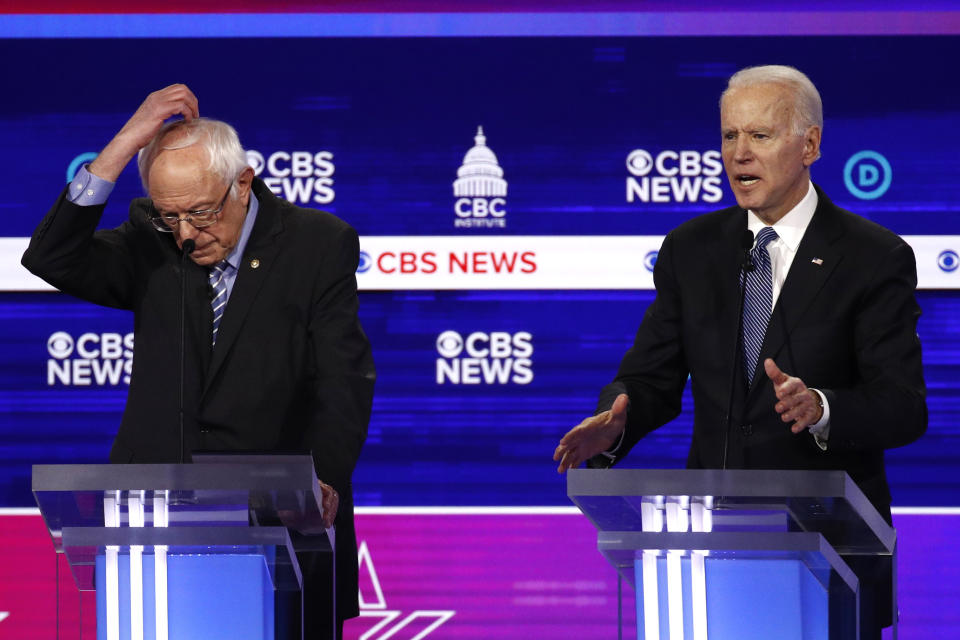 From left, Democratic presidential candidates Sen. Bernie Sanders, I-Vt., and former Vice President Joe Biden, participate in a Democratic presidential primary debate at the Gaillard Center, Tuesday, Feb. 25, 2020, in Charleston, S.C., co-hosted by CBS News and the Congressional Black Caucus Institute. (AP Photo/Patrick Semansky)