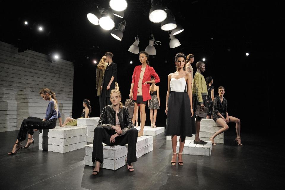 In this photo provided by Holmes & Yang, the Holmes & Yang Spring 2013 collection is modeled during Fashion Week in New York, Tuesday, Sept. 11, 2012. (AP Photo/Holmes & Yang, Dan Ashby)