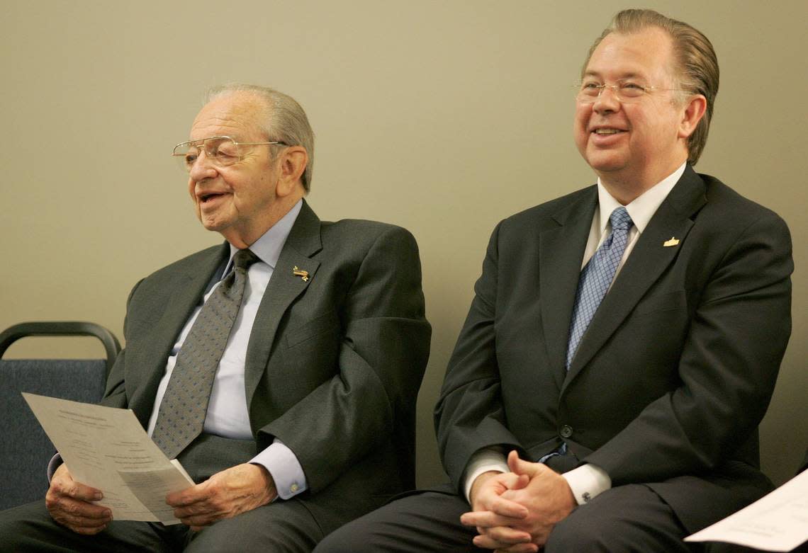 Retiring Judge Tom Vandergriff, left, and newly elected County Judge Glen Whitley share a laugh during the swearing-in ceremony at the Tarrant County Family Law Center in Fort Worth in 2007.