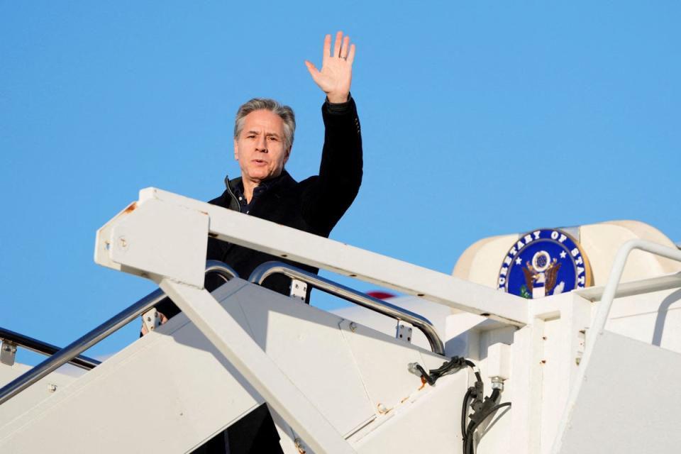 US secretary of state Antony Blinken waves as he boards a plane, en route to Saudi Arabia (Reuters)