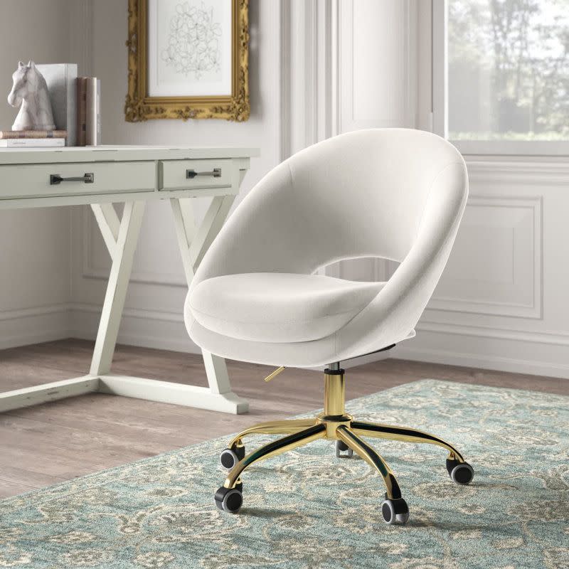 <p><a href="https://go.redirectingat.com?id=74968X1596630&url=https%3A%2F%2Fwww.wayfair.com%2F--%2Fpdp%2Fkelly-clarkson-home--lourdes-task-chair-x114428974-l10-w003317863.html&sref=https%3A%2F%2F" rel="nofollow noopener" target="_blank" data-ylk="slk:Shop Now;elm:context_link;itc:0;sec:content-canvas" class="link rapid-noclick-resp">Shop Now</a></p><p>Lourdes Task Chair </p><p>wayfair.com</p><p>$179.99</p><span class="copyright">Wayfair</span>