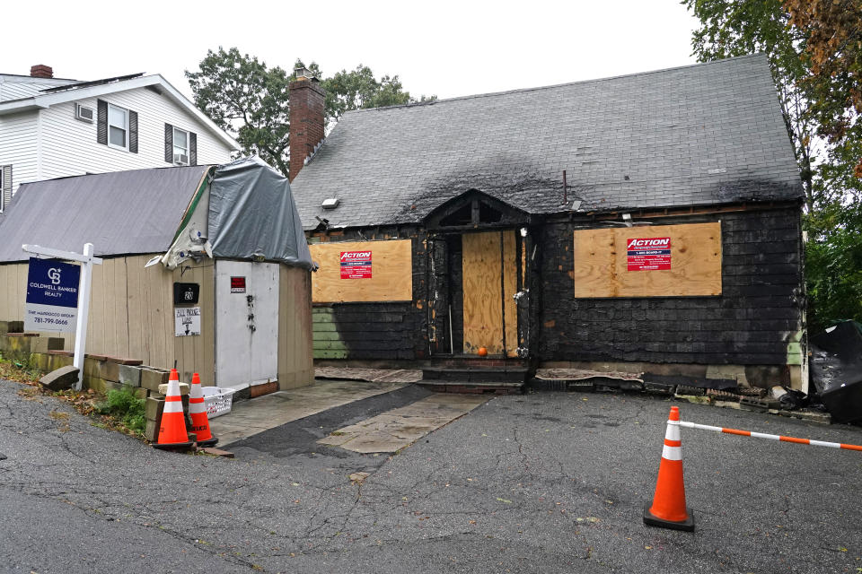 A home that was seriously damaged by fire is seen, Tuesday, Sept. 28, 2021, in Melrose, Mass. WBZ-TV reported that the $399,000 asking price for the home in Melrose, a suburb of Boston, is evidence of how hot the housing market is in the state. The online listing for the burned, three bedroom, 1,857-square foot home says it is in need of complete renovation and is being sold as is. (AP Photo/Elise Amendola)