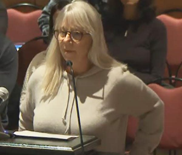 Anne Moodey, a Portsmouth resident whose solar panels proposal was rejected by the Historic District Commission, urges the City Council to remove the panel's power over solar arrays during Monday, Dec. 18, 2023.