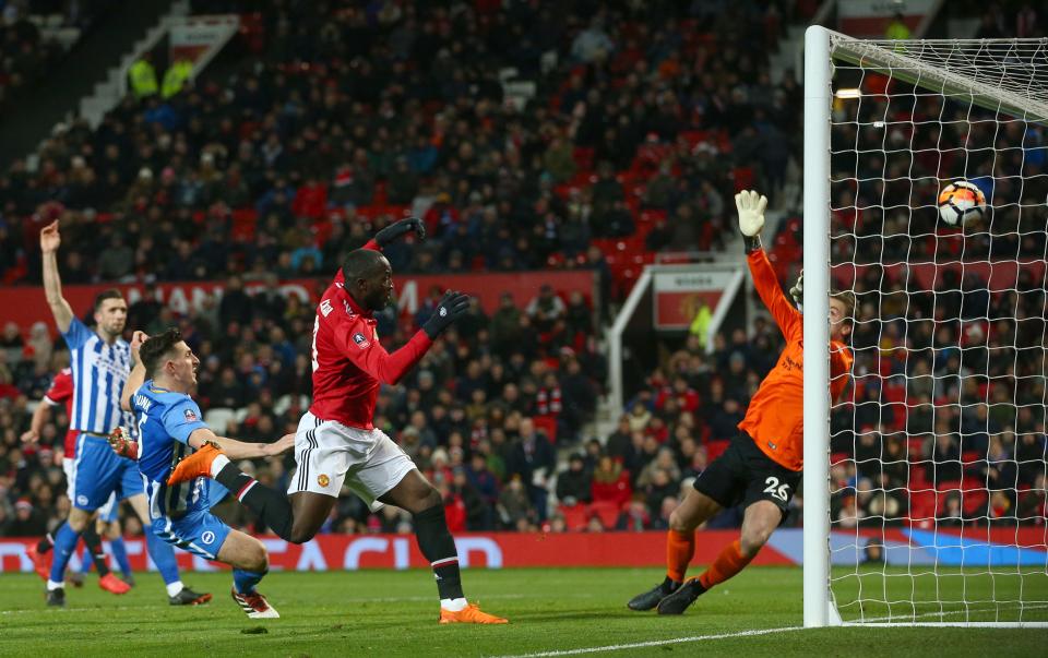 Romelu Lukaku ghosts in at the far post to head home the first against Brighton