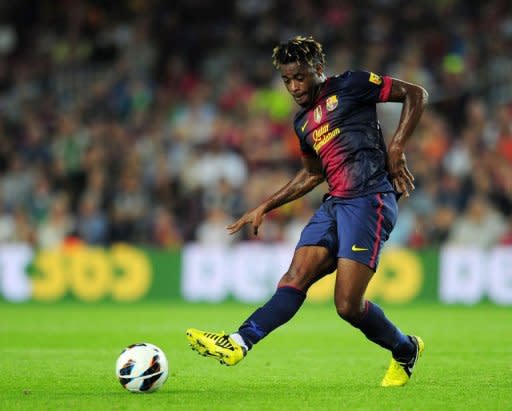 Barcelona's Cameroonian midfielder Alex Song kicks a ball during their Spanish league football match against Granada CF on September 22, at the Camp Nou stadium in Barcelona