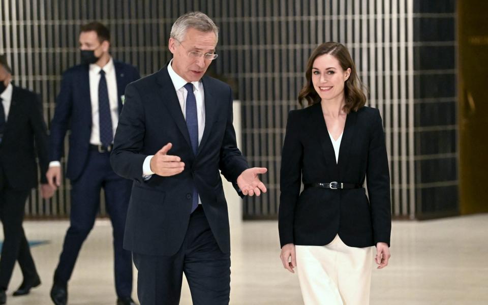 Nato Secretary-General Jens Stoltenberg meets with Finland's prime minister Sanna Marin during the North Atlantic Council's (NAC) meeting in Helsinki on 12 May, 2022. - Jussi Nukari/AFP