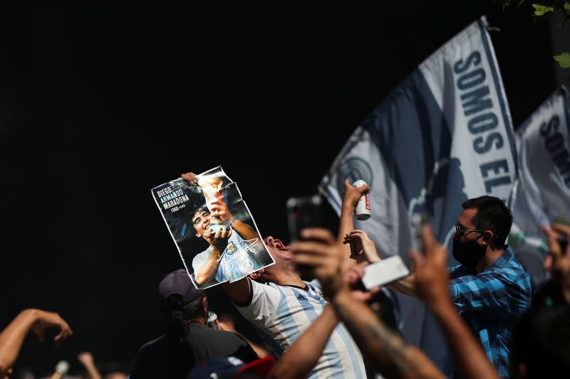 People gather to mourn the death of soccer legend Diego Armando Maradona, in Buenos Aires