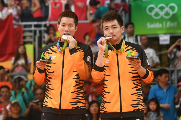 Shem Goh and Wee Kiong Tan with their silver medals after losing the badminton men's doubles final in Rio on August 19, 2016