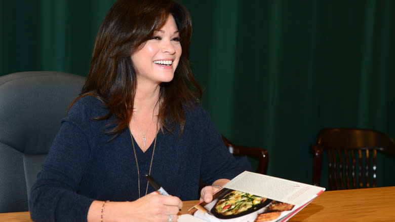 Valerie Bertinelli signing a cookbook