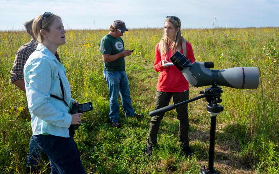 Caitlin Looby (right), Great Lakes reporter through the Report for America program, is shown at work at the headwaters of a tributary Trout Creek on the Oneida Reservation in Oneida, Wis. This is part of a 412-acre restored natural area.