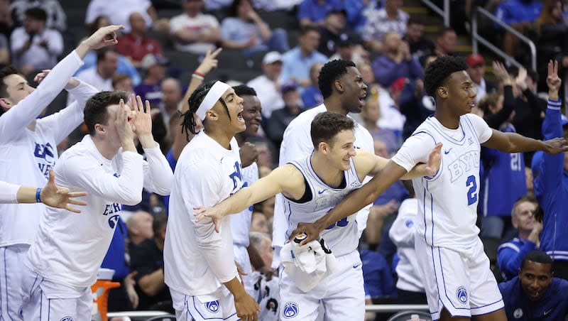 BYU players  celebrate a 3-pointer at the end of the game during the Big 12 conference championship against UCF in Kansas City, Mo., on Wednesday, March 13, 2024. Sunday, the Cougars found out what seed they receivedin the NCAA Tournament, and who and where they will play.