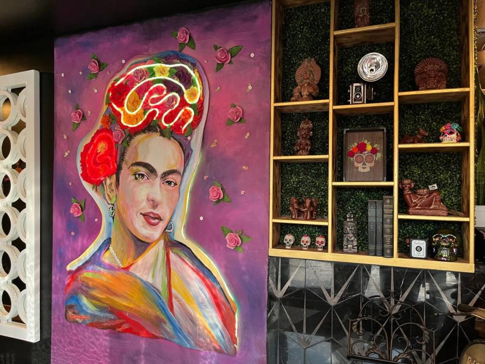 A mural of Frida Kahlo by Jorge Torres greets diners at Frida’s.
