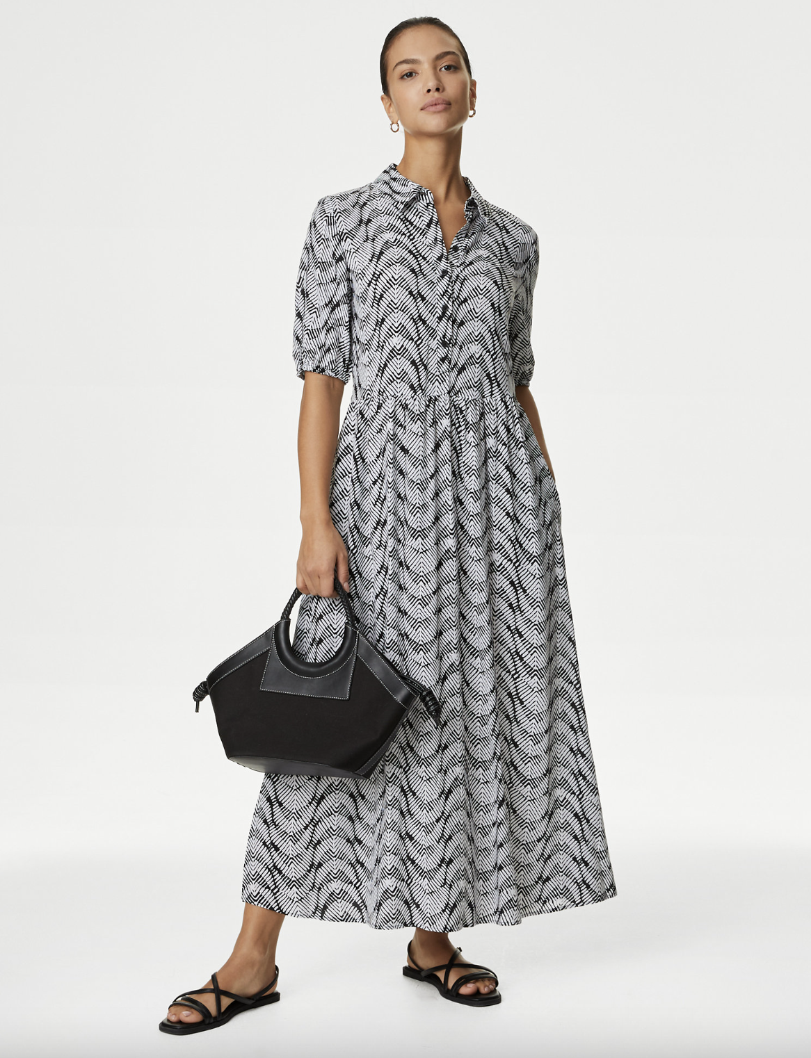 You can't go wrong with a classic midi shirt dress. (Marks & Spencer)