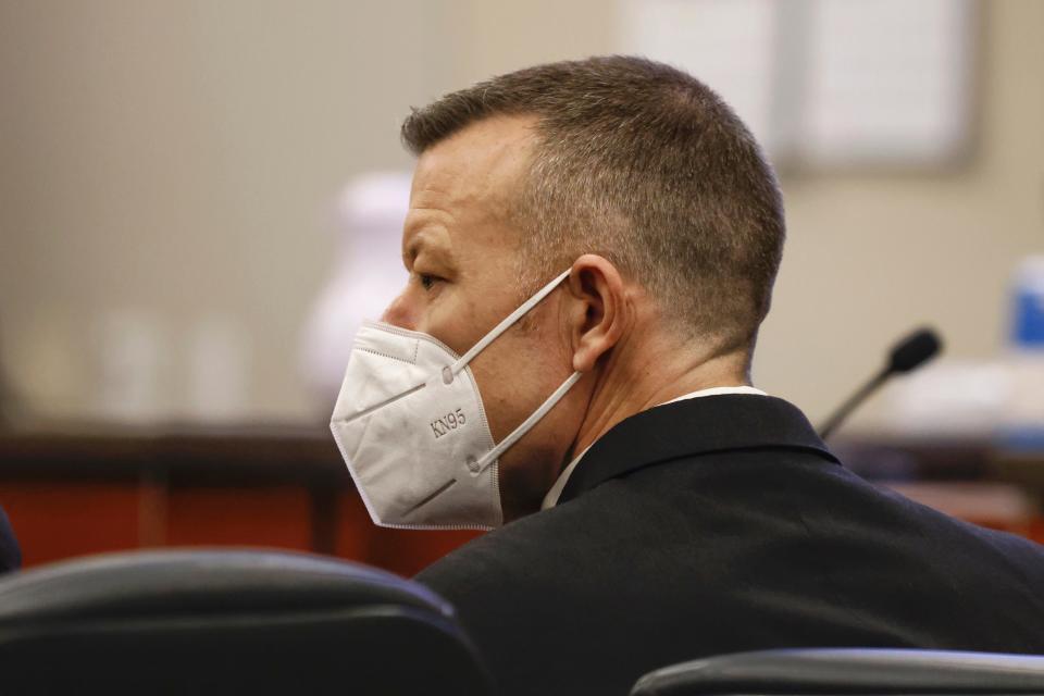 Paul Flores listens during his murder trial in Monterey County Superior Court in Salinas, Calif., Monday, July 18, 2022. Flores is accused of the murder of Kristin Smart and opening statements were expected Monday. Smart is still missing, but the man last seen with her at California Polytechnic State University in San Luis Obispo in 1996 is on trial more than a year after he was arrested on a murder charge along with his father, who is accused of helping hide her body. (Daniel Dreifuss/Monterey County Weekly via AP, Pool)