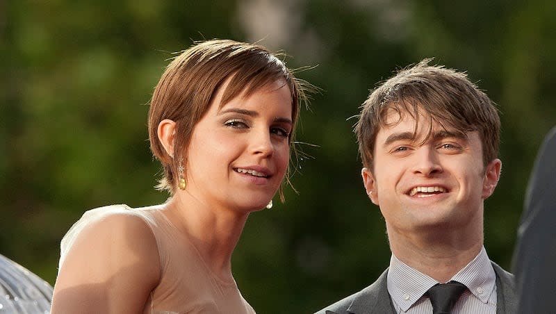 British actors Emma Watson and Daniel Radcliffe arrive in Trafalgar Square, in central London, for the world premiere of "Harry Potter and The Deathly Hallows: Part 2," the last film in the series, Thursday, July 7, 2011. J.K. Rowling said “Harry Potter” actors Daniel Radcliffe and Emma Watson can “save their apologies” in a series of tweets regarding transgender rights.