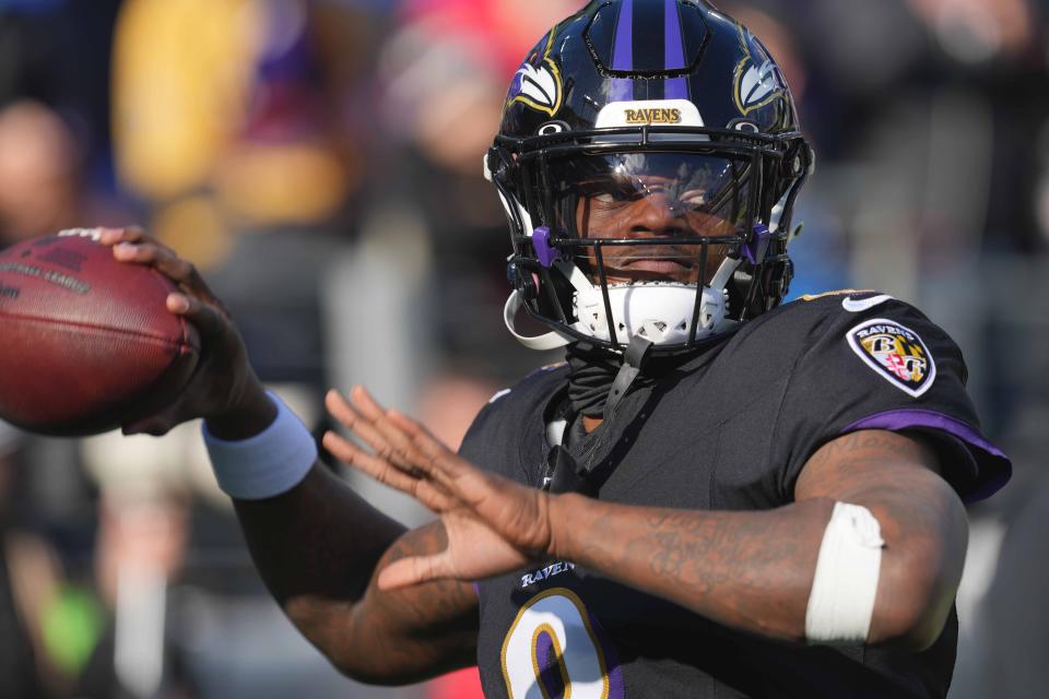 Dec 31, 2023; Baltimore, Maryland, USA; Baltimore Ravens quarterback Lamar Jackson (8) warms up prior to the game against the Miami Dolphins at M&T Bank Stadium. Mandatory Credit: Mitch Stringer-USA TODAY Sports