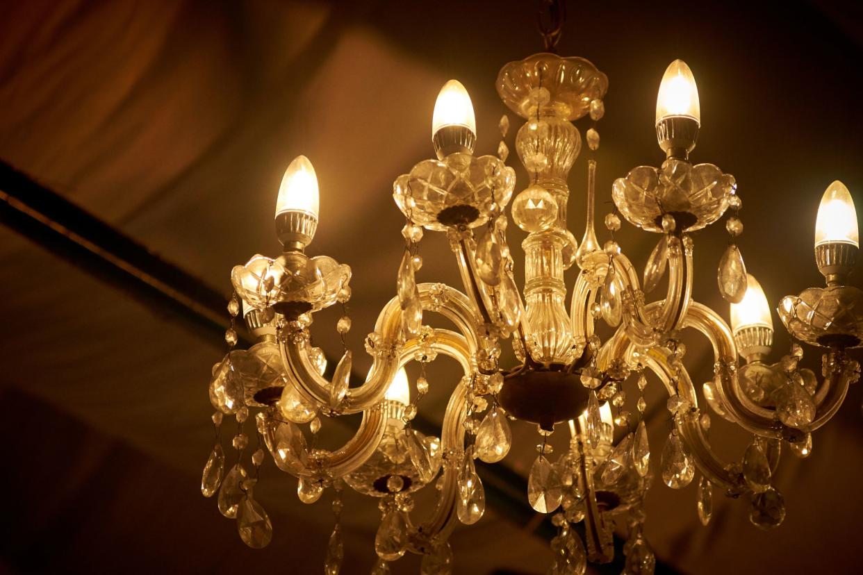 Close up picture of old chandelier in ceiling 