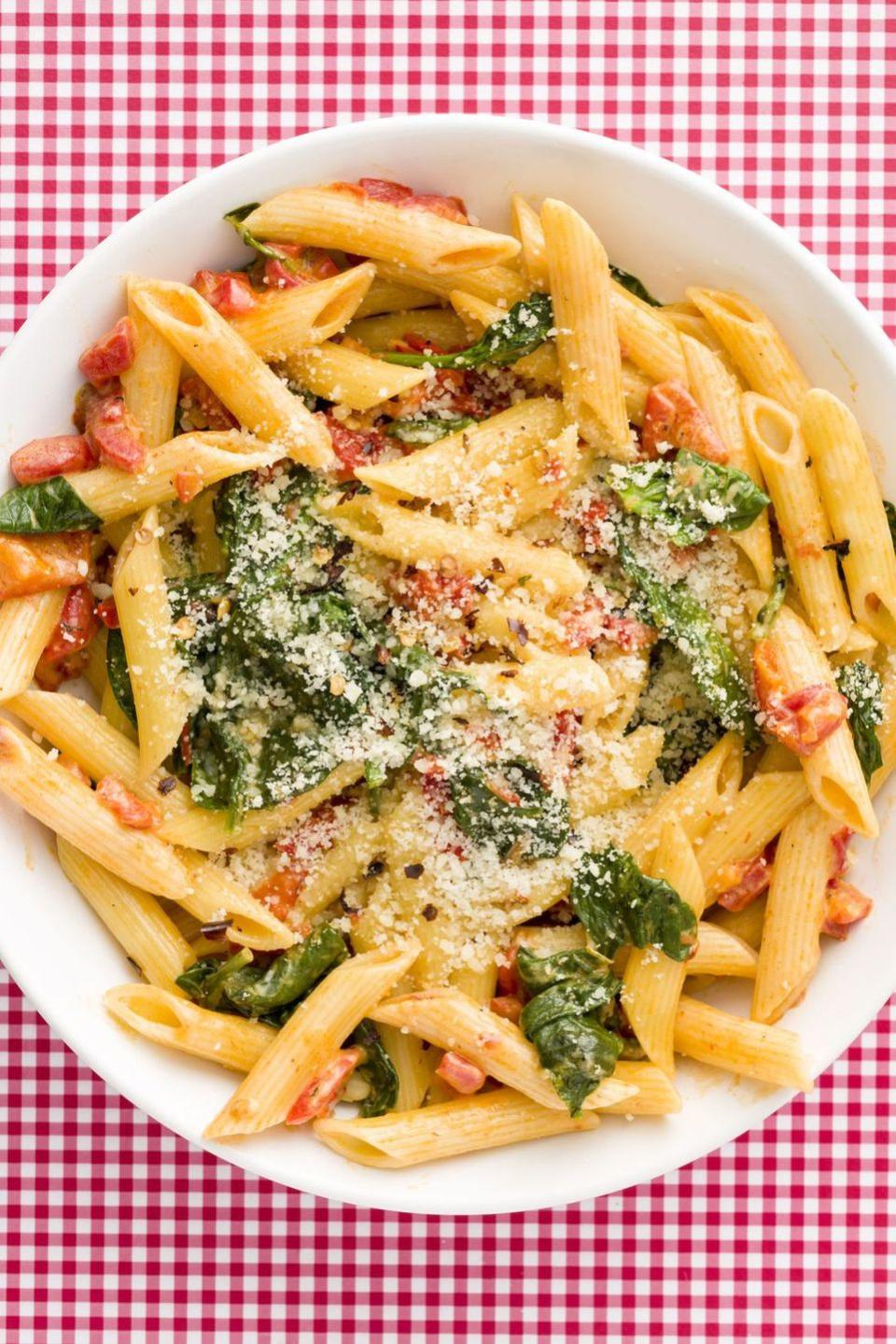 <p>With a super-light cream sauce, this spinach and roasted red pepper penne is addictive.</p><p>Get the <a href="https://www.delish.com/uk/cooking/recipes/a33990117/creamy-roasted-red-pepper-penne-recipe/" rel="nofollow noopener" target="_blank" data-ylk="slk:Creamy Roasted Red Pepper Penne;elm:context_link;itc:0;sec:content-canvas" class="link ">Creamy Roasted Red Pepper Penne</a> recipe.</p>