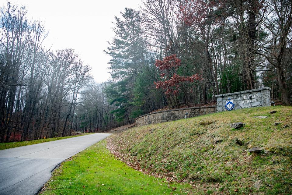 A stone sign marks the entrance to Asheville School on the west side of Asheville on Dec. 1, 2020. 