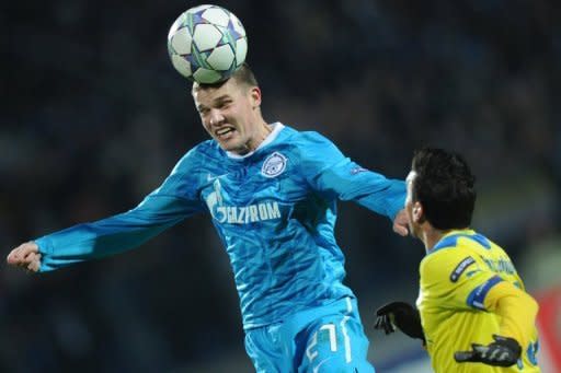 Igor Denisov (L) of Zenit St Petersburg fights for the ball against Constantinos Charalambides of APOEL FC during a UEFA Champions League match in Saint-Petersburg, 2011. Zenit Saint Petersburg midfielder Igor Denisov has branded new signing Hulk a second-rate star after being demoted from the first team for speaking out about the Brazilian striker's lucrative contract