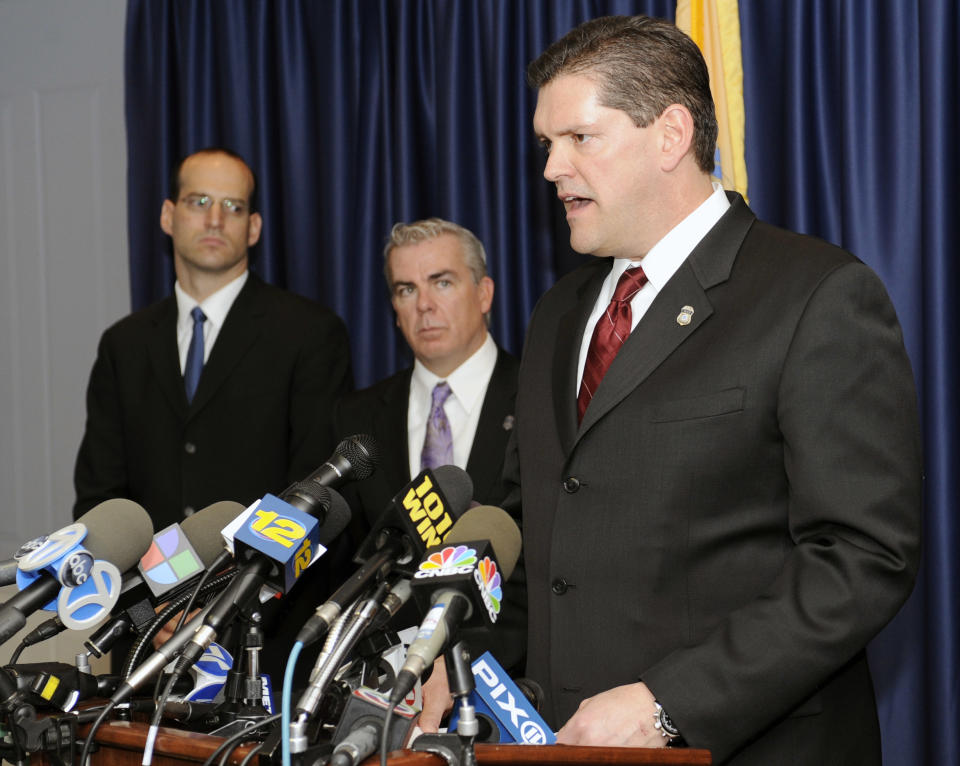 Homeland Security Investigations Associate Director James A. Dinkins speaks at a news conference announcing the uncovering of one of the largest counterfeit goods smuggling operations ever charged Friday, March 2, 2012, in Newark, N.J. (AP Photo/Bill Kostroun)