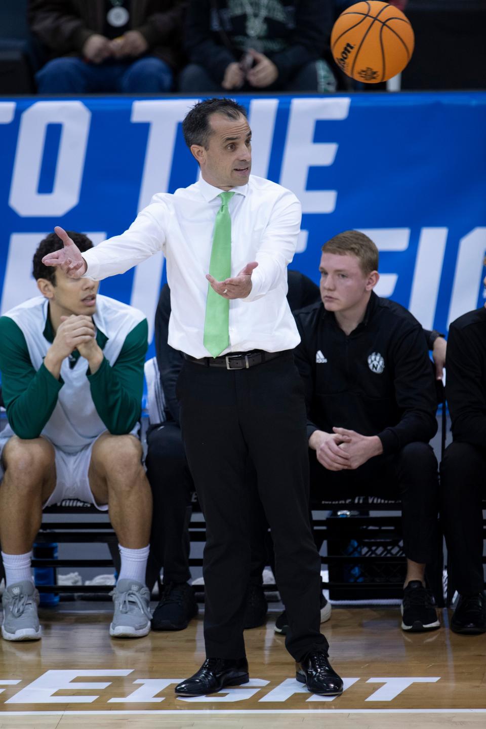 Northwest Missouri's Head Coach Ben McCollum questions a referee during their semifinal game of the 2022 NCAA DII Men's Basketball Championship.