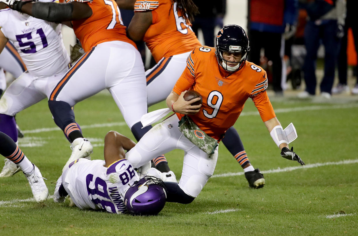 Nick Foles is sacked by D.J. Wonnum of the Minnesota Vikings on Monday night. (Photo by Jonathan Daniel/Getty Images)
