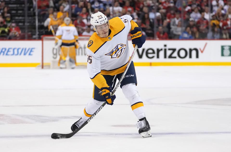 Feb 22, 2022; Sunrise, Florida, USA; Nashville Predators defenseman Philippe Myers (55) passes the puck during the first period against the Florida Panthers at FLA Live Arena. Mandatory Credit: Jasen Vinlove-USA TODAY Sports