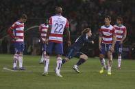 Football Soccer - Granada v Real Madrid- Spanish Liga BBVA - Nuevo Los Carmenes stadium, Granada - 7/2/16 Real Madrid's Luka Modric (3rd R) celebrates after scoring against Granada. REUTERS/Pepe Marin