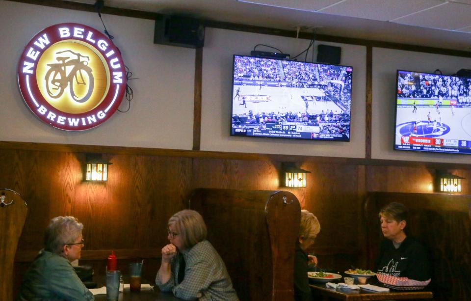 Patrons dine inside Shakespeare's Pub & Grill.