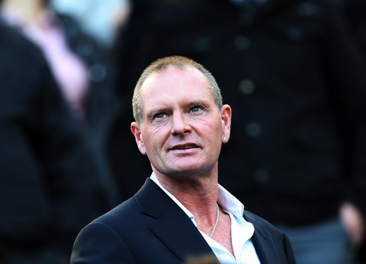 FILE - In this Oct. 16, 2011 file photo, Paul Gascoigne, is seen at the English Premier League soccer match between Newcastle United and Tottenham Hotspurs at St James' Park, Newcastle, England. According to news reports published Sunday March 10, 2013, Gascoigne says he's back from brink of death after receiving treatment for alcoholism in USA. The 45-year-old Gascoigne flew back home on Saturday, a month after being admitted to the intensive care unit of a hospital in Phoenix, USA, following a relapse in his long-running struggle with alcoholism. (AP Photo/Scott Heppell, File)