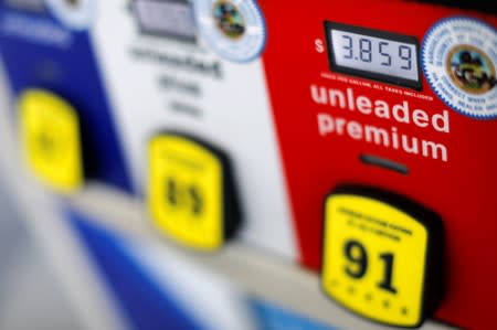 FILE PHOTO: The current price of gasoline is shown on a gas pump at an Arco gas station in San Diego