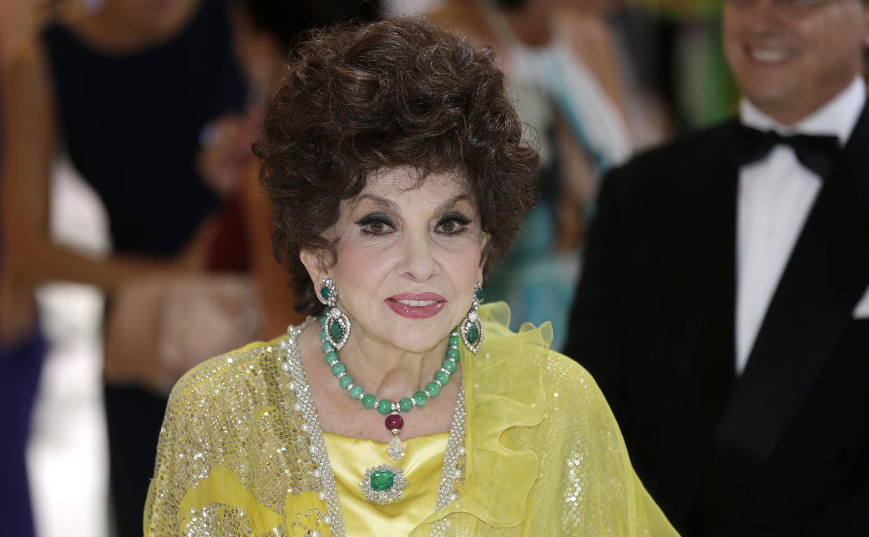 Italian actress Gina Lollobrigida arrives at the "Monaco Red Cross Ball", Friday, Aug. 1, 2014, in Monaco. 