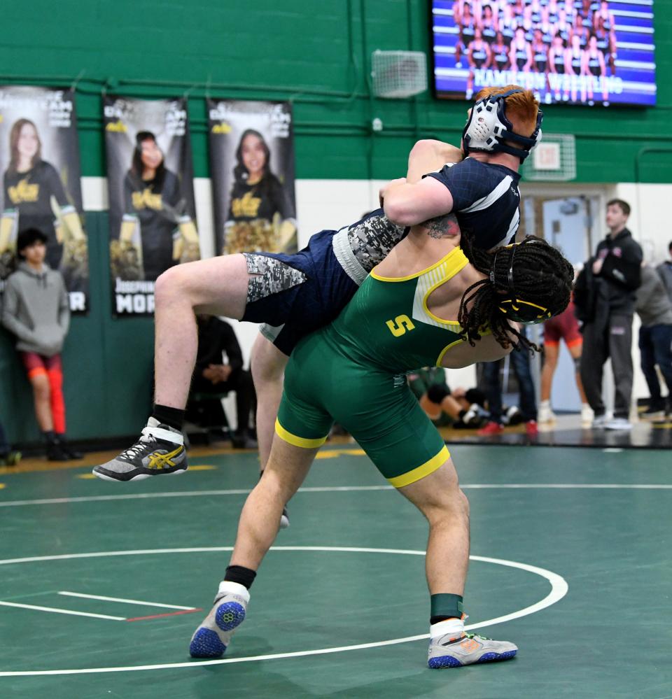 Eugene Harney at the Sycamore Invitational Tournament on Jan. 13. Harney won the 157-pound class at the event after pinning all four opponents in less than a minute each.