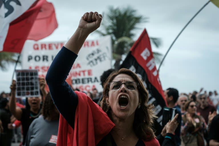 People protest in front of the house of lower house speaker Rodrigo Maia, who would initially take over the presidency if President Michel Temer resigns or is impeached, in Rio de Janeiro, on May 21, 2017