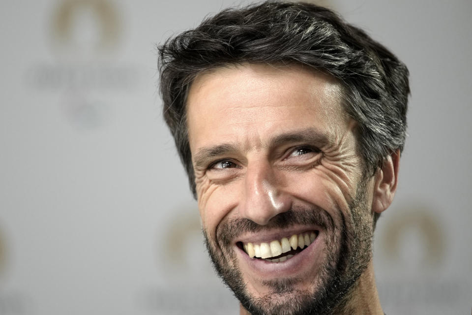 Paris 2024 Olympics Organizing Committee President Tony Estanguet smiles during an interview with the Associated Press in Saint-Denis, outside Paris, France, Tuesday, June 27, 2023. (AP Photo/Christophe Ena)