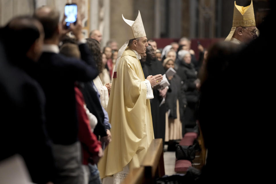 Secretary of former Pope Benedict XVI, Archbishop Georg Gaenswein holds a mass to mark a one year anniversary of the death of Pope Benedict, in St. Peter's Basilica, the Vatican, Sunday, Dec. 31, 2023. Gaenswein has been the former private secretary to Pope Benedict XVI for many years until his death on Dec. 31, 2022. (AP Photo/Andrew Medichini)