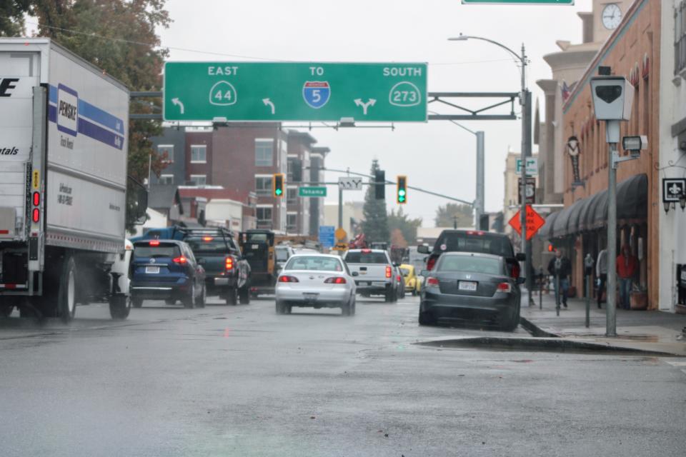 File photo - Cars line Market Street in downtown Redding during a rainy Friday on Nov. 13, 2020.
