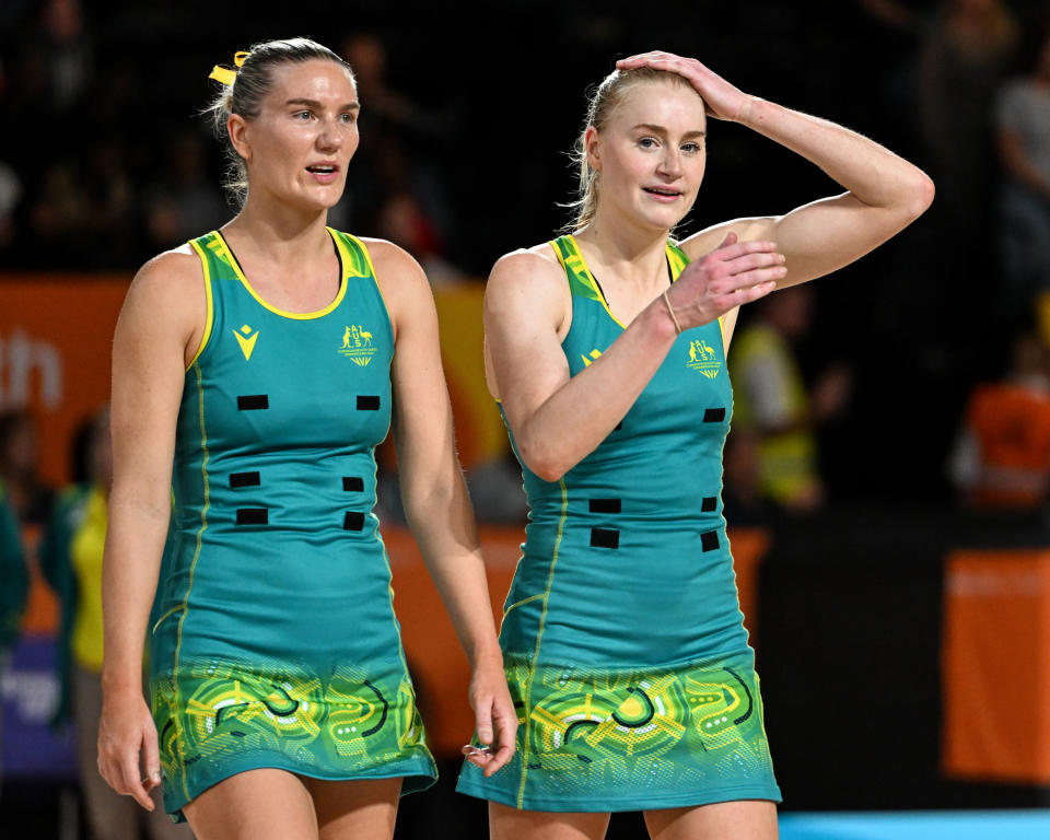 Courtney Bruce and Jo Weston, pictured here after Australia's loss to Jamaica at the Commonwealth Games.