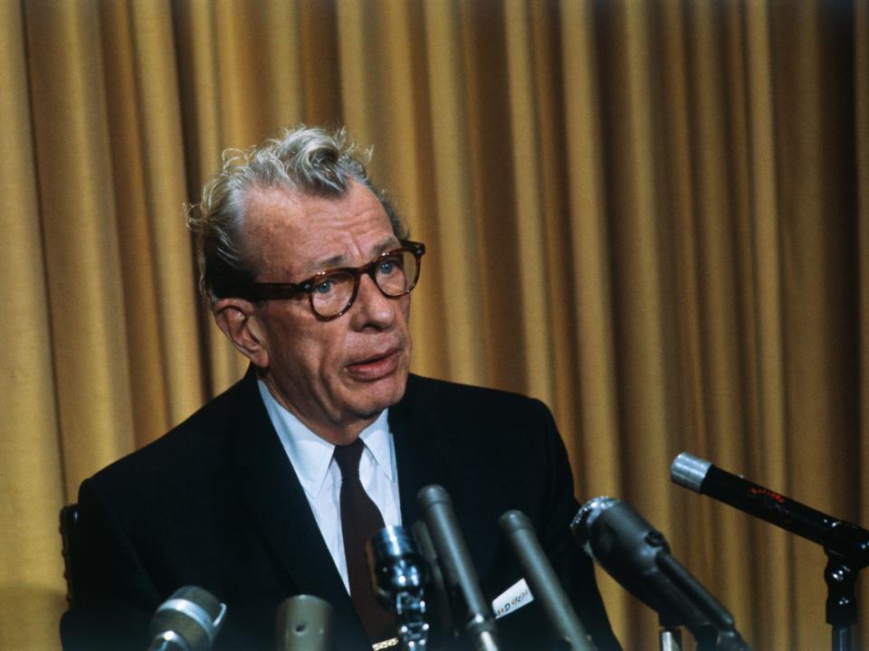 Sen. Everett M. Dirsen, Republican from Illinois, speaks in front of several microphones.