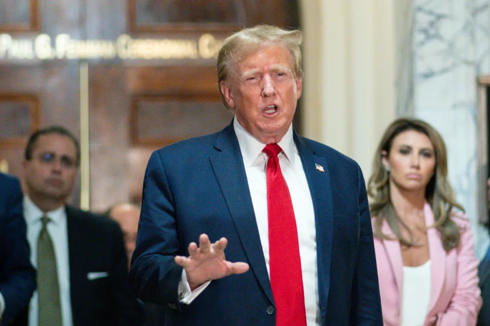 Former President Donald Trump speaks after exiting the courtroom for a break at New York Supreme Court, Dec. 7, 2023, in New York.