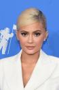 <p>Looking every inch the daughter of Kris Jenner in her white blazer at the MTV VMAs in 2018.</p><p>At just 21 years old Kylie already looks like the business power house she is. We love her soft brown smokey eye and chic up-do.</p>
