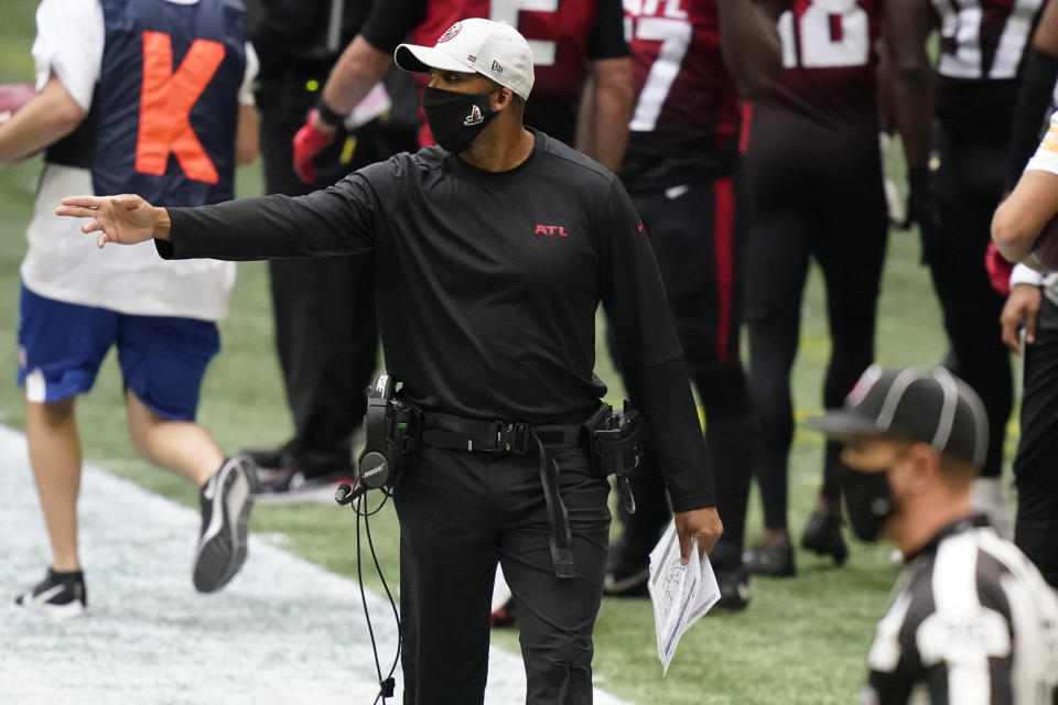 Atlanta Falcons head coach Raheem Morris speaks during the first half of an NFL football game against the Detroit Lions, Sunday, Oct. 25, 2020, in Atlanta. (AP Photo/Brynn Anderson)