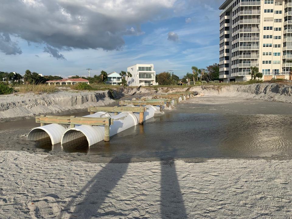 Hurricane Ian caused severe erosion damage to Alhambra Road just north of Venice Sands condominiums on Venice Beach. The erosion uncovered the twin pipes of Stormwater Outfall No. 2 and created a significant hazard for people on the beach.