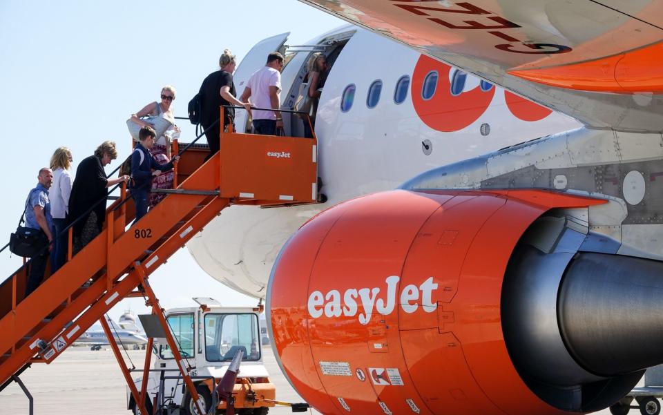 Low-cost airline easyJet does offer compensation to 'bumped' passengers - Rex Features