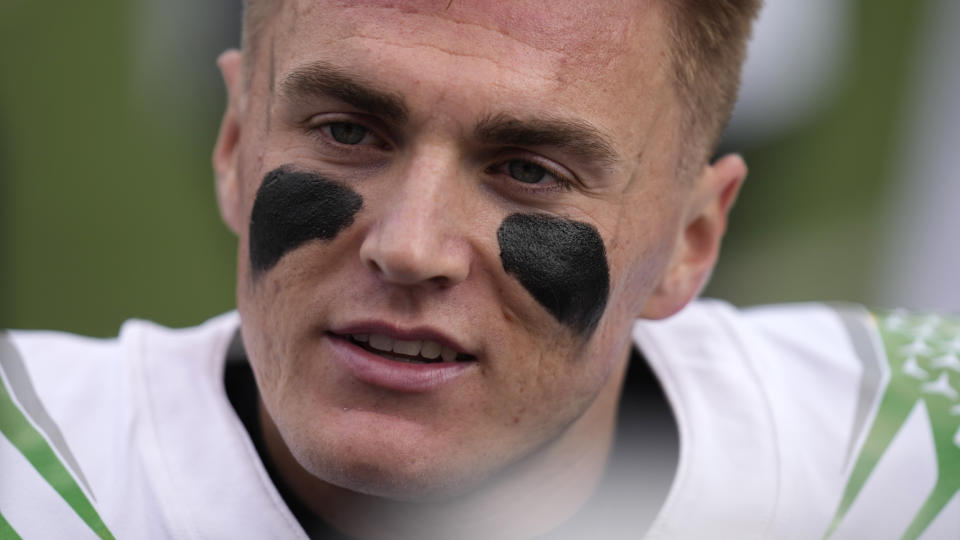 Oregon quarterback Bo Nix (10) looks on during the first half of an NCAA college football game against Utah Saturday, Oct. 28, 2023, in Salt Lake City. (AP Photo/Rick Bowmer)