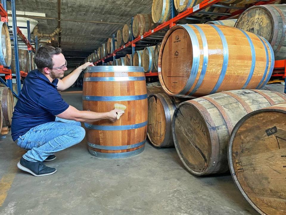 Jeremy Grunewald preps a barrel that will be used for a test. Grunewald is one of three partners that started Devil’s Cask, a Fort Worth-based startup. The group is testing a silicone-based technology that will help distilleries keep more of their product.