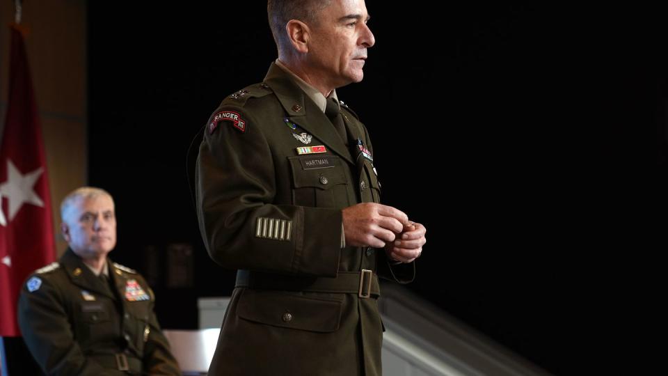 Army Maj. Gen. William J. Hartman, commander of Cyber National Mission Force, foreground, is seen at ceremony in December 2022. (Provided/CYBERCOM)